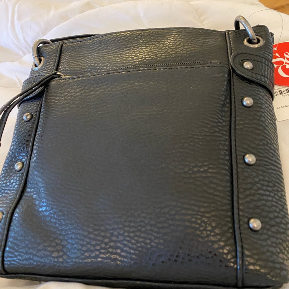 Style and company crossbody bag. NWT and new used. 8.5 inches tall
